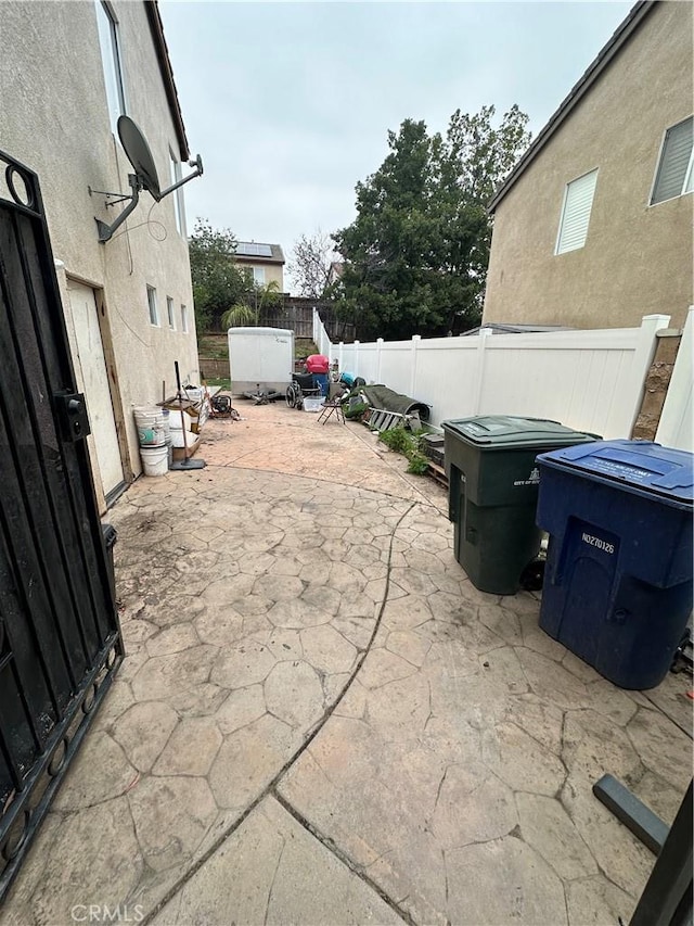 view of patio with a fenced backyard