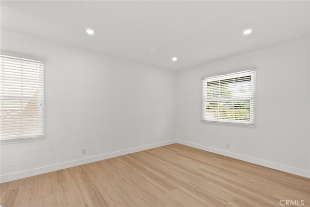 13807 Wyandotte St, Van Nuys, CA 91405 - spare room with light wood-style flooring, baseboards, and recessed lighting
