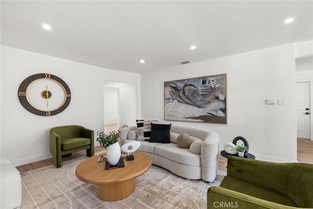 13807 Wyandotte St, Van Nuys, CA 91405 - living area with light wood-style floors, baseboards, and recessed lighting