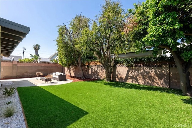 13807 Wyandotte St, Van Nuys, CA 91405 - view of yard featuring a patio and an outdoor living space