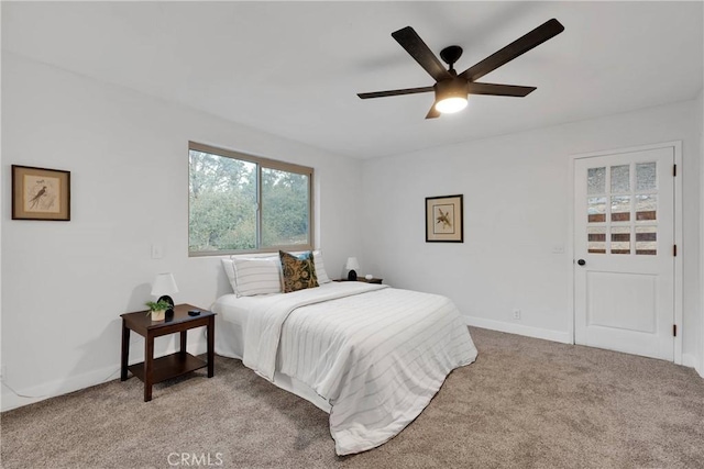 1897 Desert Front Rd, Wrightwood, CA 92397 - bedroom featuring light colored carpet, a ceiling fan, and baseboards