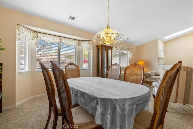 1400 Genoa Way, Santa Maria, CA 93455 - carpeted dining space with visible vents, baseboards, and an inviting chandelier