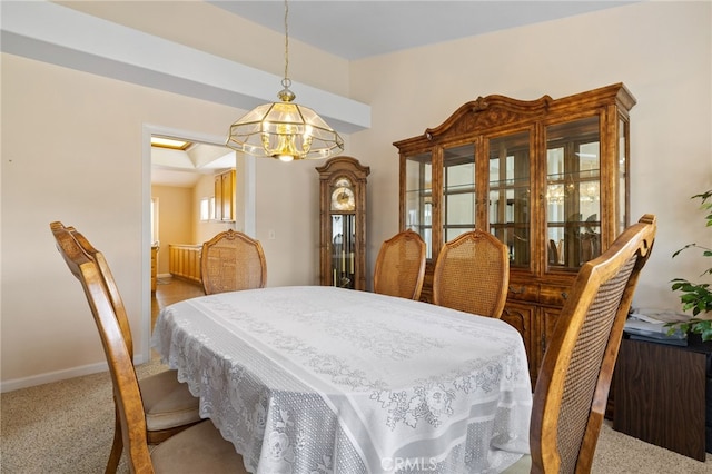 1400 Genoa Way, Santa Maria, CA 93455 - carpeted dining area with a notable chandelier and baseboards