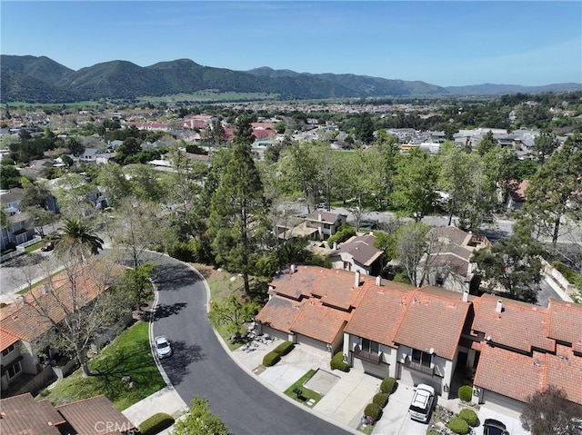 drone / aerial view featuring a mountain view and a residential view