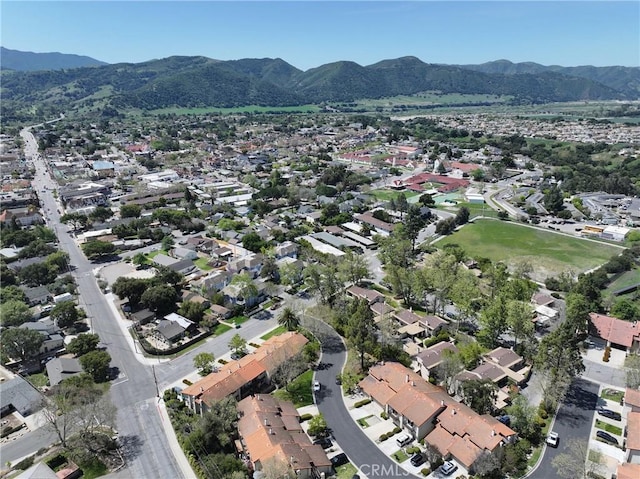 aerial view with a mountain view and a residential view