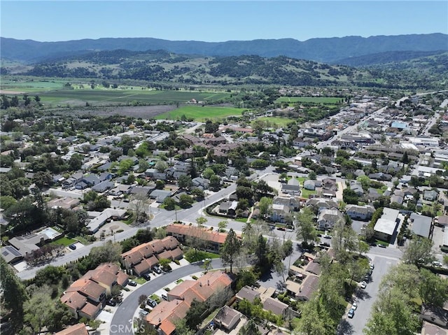 aerial view featuring a residential view and a mountain view