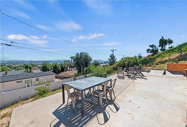 15160 Darnell Dr, Lake Elsinore, CA 92530 - view of patio with outdoor dining space and fence
