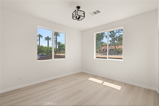 5978 Copperfield Ave, Riverside, CA 92506 - empty room with light wood-style floors and baseboards
