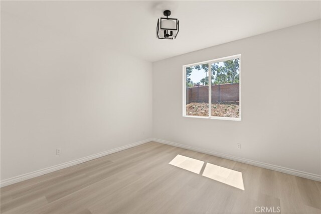 5978 Copperfield Ave, Riverside, CA 92506 - spare room with light wood-type flooring and baseboards