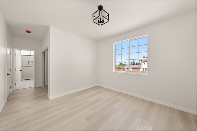 5978 Copperfield Ave, Riverside, CA 92506 - unfurnished room featuring light wood finished floors and baseboards