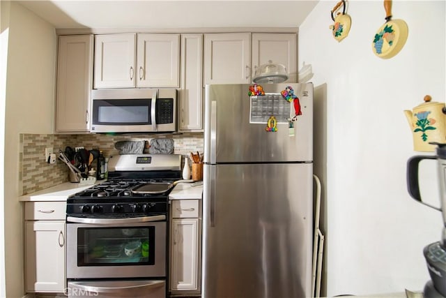 8601 International Ave Unit 265, Canoga Park, CA 91304 - kitchen with appliances with stainless steel finishes, light countertops, and backsplash