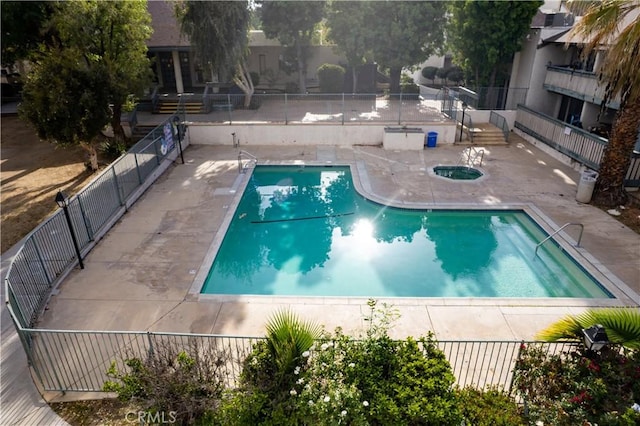8601 International Ave Unit 265, Canoga Park, CA 91304 - community pool featuring a patio area and fence