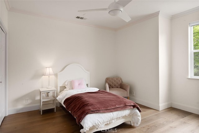 11 Sycamore Valley Rd, Chico, CA 95973 - bedroom featuring wood finished floors, baseboards, crown molding, and ceiling fan