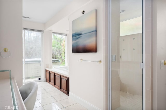 11 Sycamore Valley Rd, Chico, CA 95973 - bathroom with a freestanding bath, tile patterned flooring, a shower stall, and vanity