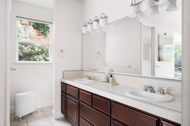11 Sycamore Valley Rd, Chico, CA 95973 - full bathroom featuring double vanity, tile patterned floors, and baseboards