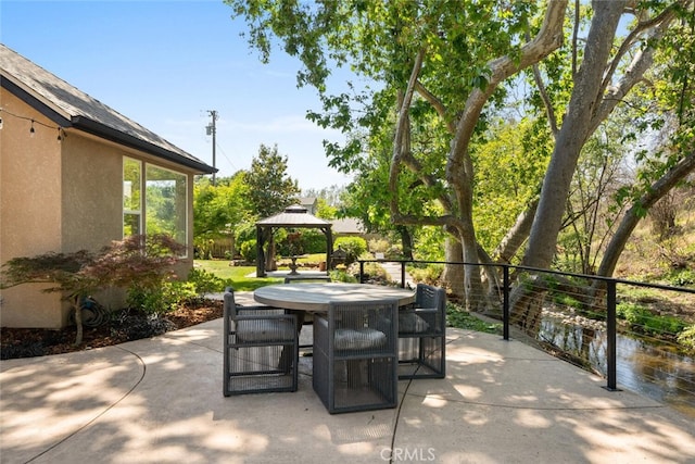 11 Sycamore Valley Rd, Chico, CA 95973 - view of patio featuring a gazebo and outdoor dining area