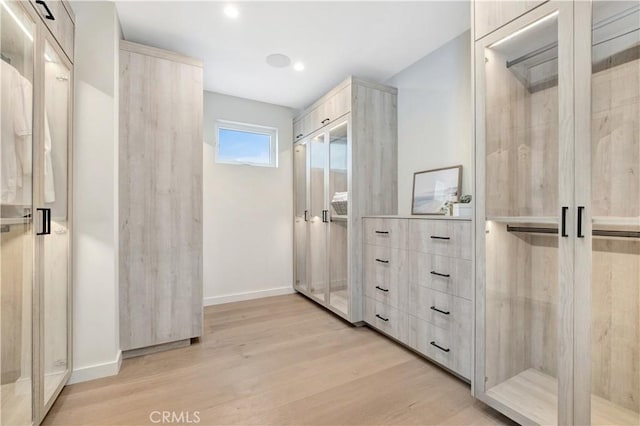 607 12th St, Huntington Beach, CA 92648 - spacious closet featuring light wood-style floors