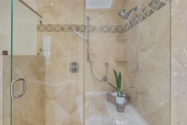 bathroom featuring a stall shower