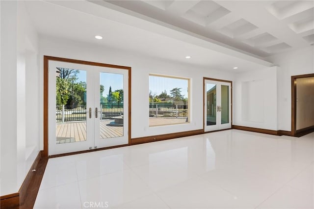 spare room featuring recessed lighting, tile patterned floors, french doors, and coffered ceiling