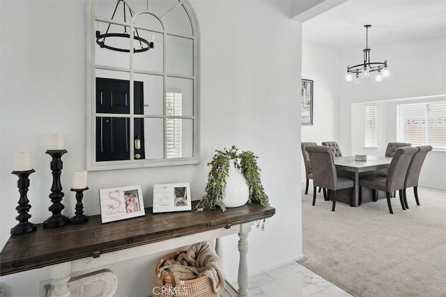 42370 61st St W, Lancaster, CA 93536 - dining area featuring a chandelier and marble finish flooring