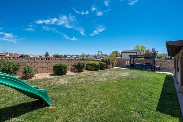 42370 61st St W, Lancaster, CA 93536 - fenced backyard with a playground, a pergola, and a patio area