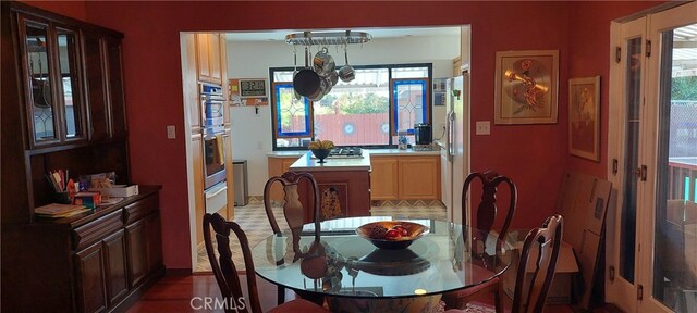 dining space featuring plenty of natural light