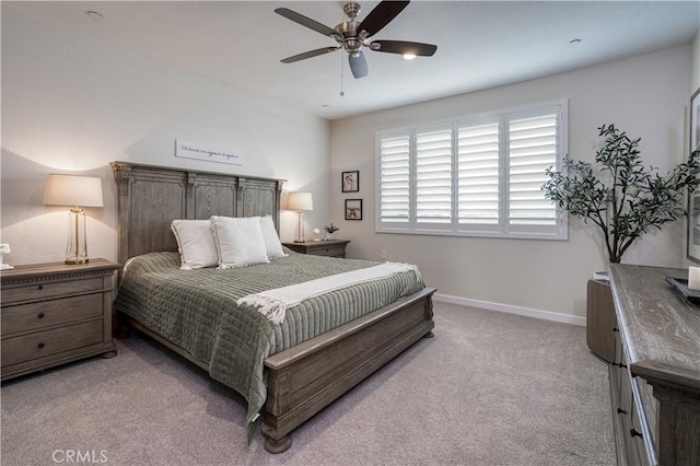1093 Traverse Dr S, Madera, CA 93636 - bedroom featuring baseboards, light carpet, and a ceiling fan