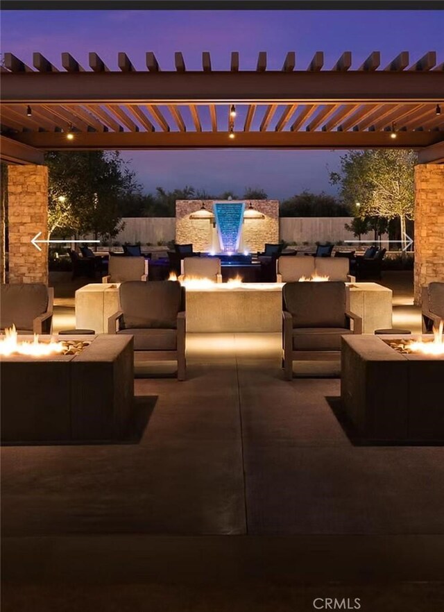 1093 Traverse Dr S, Madera, CA 93636 - view of patio / terrace featuring an outdoor living space with a fire pit and a pergola