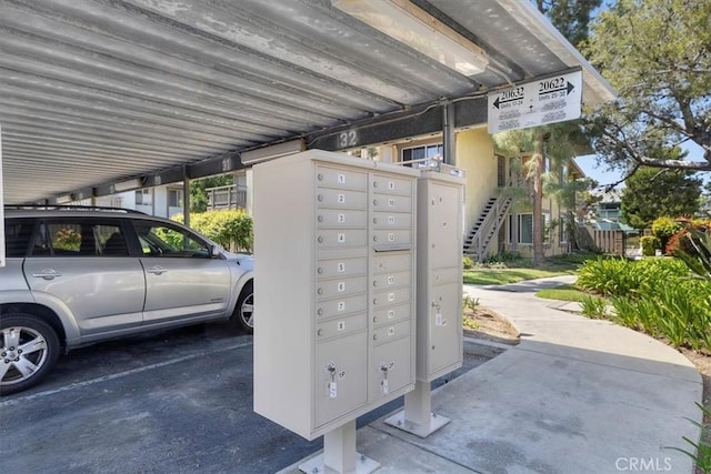 view of home's community with mail area
