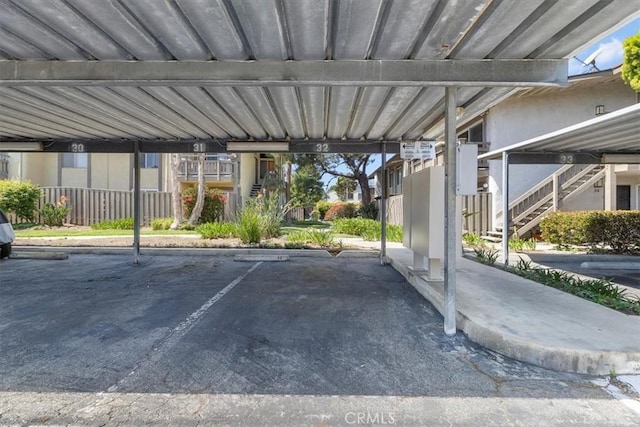 covered parking lot with stairs