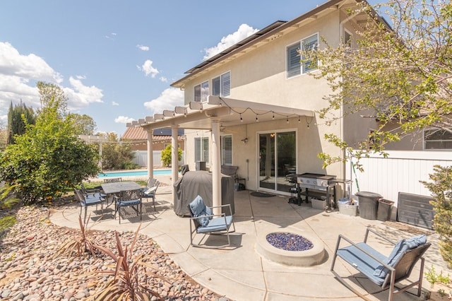 32133 Kale Ln, Winchester, CA 92596 - rear view of property with stucco siding and a patio area