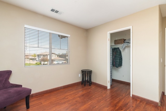 32133 Kale Ln, Winchester, CA 92596 - bedroom with wood finished floors, a spacious closet, baseboards, and a closet