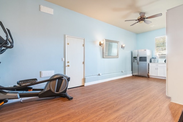 32133 Kale Ln, Winchester, CA 92596 - workout room featuring light wood finished floors, ceiling fan, and baseboards
