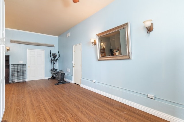 32133 Kale Ln, Winchester, CA 92596 - workout area featuring wood finished floors and baseboards