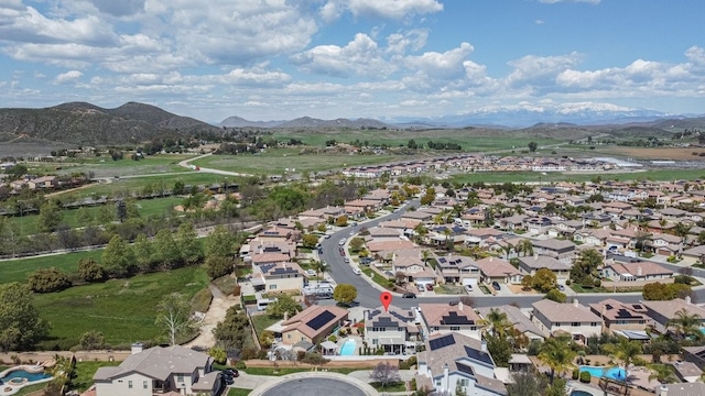 aerial view with a mountain view and a residential view