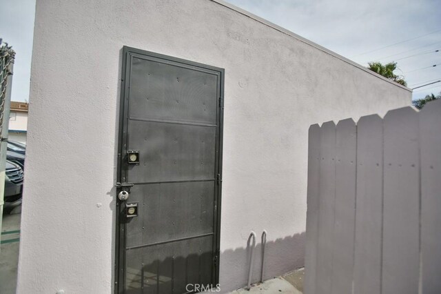 1608 N Placentia Ave, Fullerton, CA 92831 - doorway to property featuring stucco siding