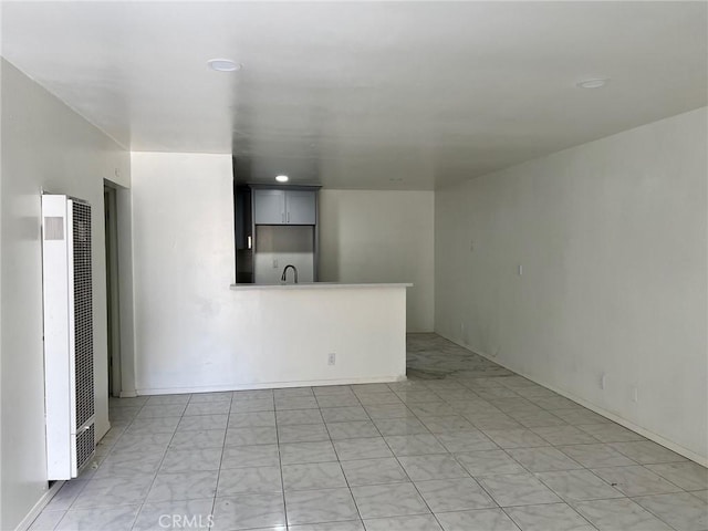 1608 N Placentia Ave, Fullerton, CA 92831 - spare room with a heating unit and a sink