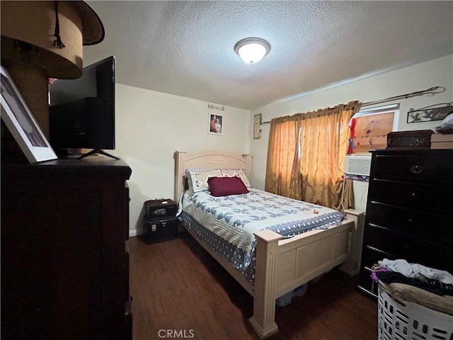 1608 N Placentia Ave, Fullerton, CA 92831 - bedroom with dark wood-style floors and a textured ceiling