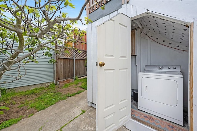 laundry area with laundry area and washer / clothes dryer