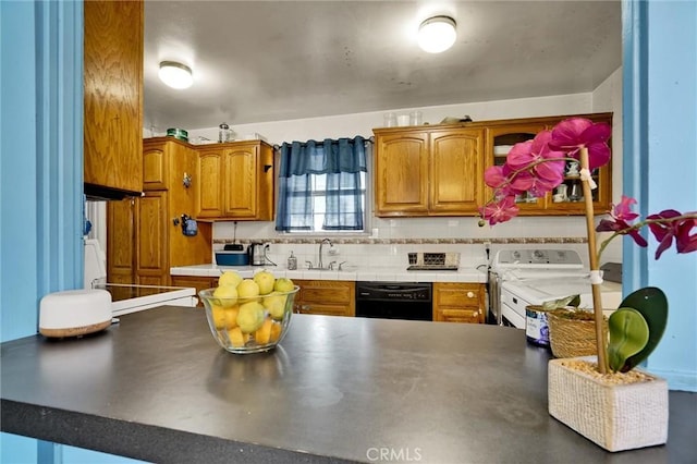 2807 W 129th, Gardena, CA 90248 - kitchen featuring brown cabinetry, black dishwasher, a sink, and stove
