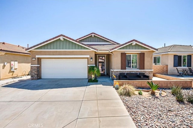 17985 Crabapple Ct, San Bernardino, CA 92407 - craftsman house with a tiled roof, stucco siding, stone siding, an attached garage, and concrete driveway