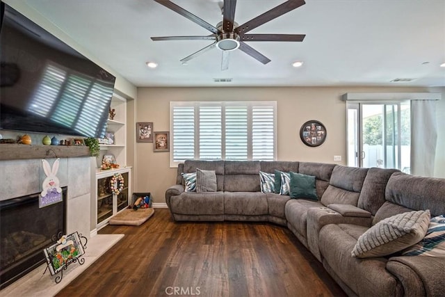17985 Crabapple Ct, San Bernardino, CA 92407 - living area featuring dark wood-type flooring, ceiling fan, baseboards, and visible vents