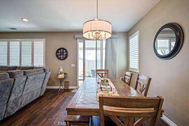 17985 Crabapple Ct, San Bernardino, CA 92407 - dining room featuring a chandelier, baseboards, dark wood finished floors, and visible vents