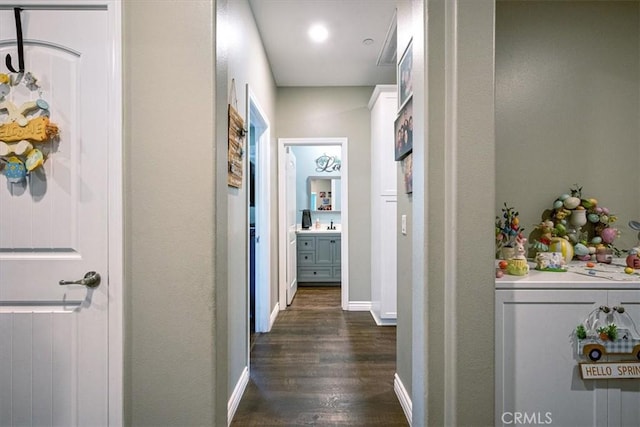 17985 Crabapple Ct, San Bernardino, CA 92407 - hallway featuring baseboards and dark wood finished floors