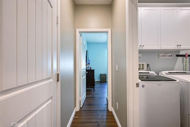 17985 Crabapple Ct, San Bernardino, CA 92407 - laundry area featuring dark wood finished floors, washing machine and dryer, baseboards, and cabinet space