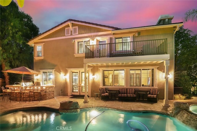 3973 Coast Oak Cir, Chino Hills, CA 91709 - back of house with french doors, outdoor dry bar, a balcony, an outdoor hangout area, and a patio