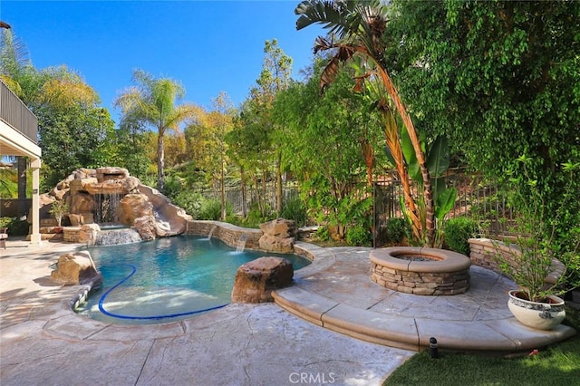 3973 Coast Oak Cir, Chino Hills, CA 91709 - pool featuring a fenced backyard, a fire pit, and a patio