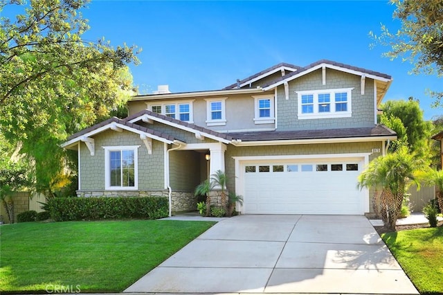 3973 Coast Oak Cir, Chino Hills, CA 91709 - craftsman house featuring a garage, stone siding, a front yard, and concrete driveway