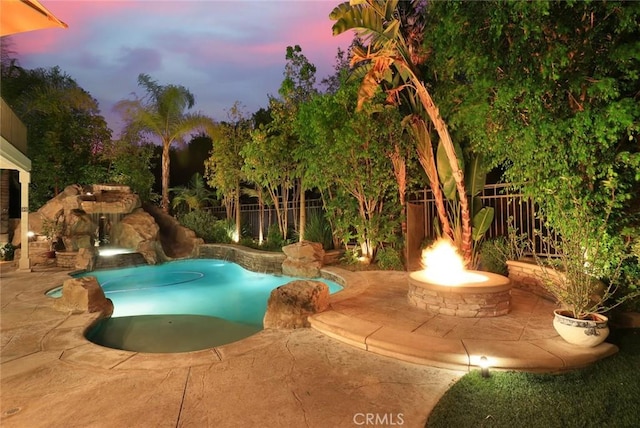 3973 Coast Oak Cir, Chino Hills, CA 91709 - view of swimming pool featuring a fenced backyard, a patio area, a fenced in pool, and an outdoor fire pit