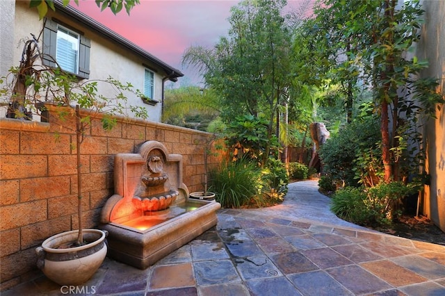 3973 Coast Oak Cir, Chino Hills, CA 91709 - patio terrace at dusk featuring a fenced backyard